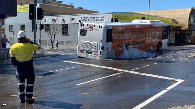 Sydney sinkhole claims bus